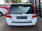 Volvo V70 2.5FT R-Design 230PK Automaat LEER / XENON / PDC, Auto's, Volvo, Gebruikt, Zwart, Stoelverwarming, Onderhoudsboekje