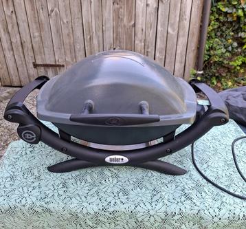 Zeer mooie Electrische BBQ Weber . Model 1400. Met hoes. beschikbaar voor biedingen