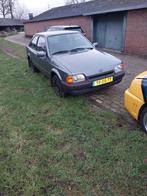 Ford Escort 2.0 16v 1988 Grijs, Auto's, Voorwielaandrijving, Escort, 4 cilinders, 411 kg