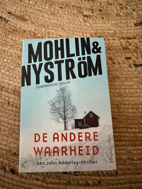 Peter Mohlin - De andere waarheid, Boeken, Thrillers, Zo goed als nieuw, Verzenden