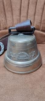 Bronzen (koe) bel, Ophalen