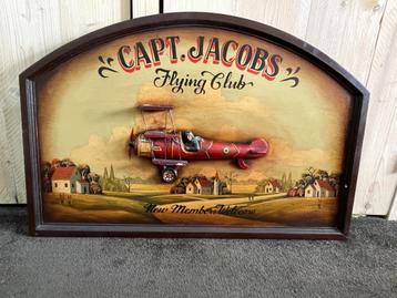 Wanddecoratiebord Capt. Jacobs Flying Club beschikbaar voor biedingen