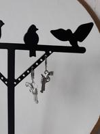 Zilverkleurige revolver Oorbellen, Overige materialen, Hangers, Nieuw, Ophalen of Verzenden