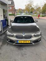 BMW 1-Serie 116i 109pk 2017 Grijs, Auto's, BMW, 1-Serie, 65 €/maand, Achterwielaandrijving, 1280 kg