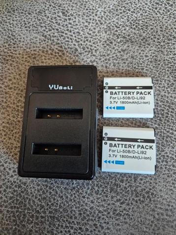 Dubbele oplader met twee Li-50B batterijen  beschikbaar voor biedingen