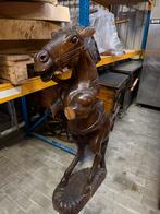 Houten paard, Ophalen