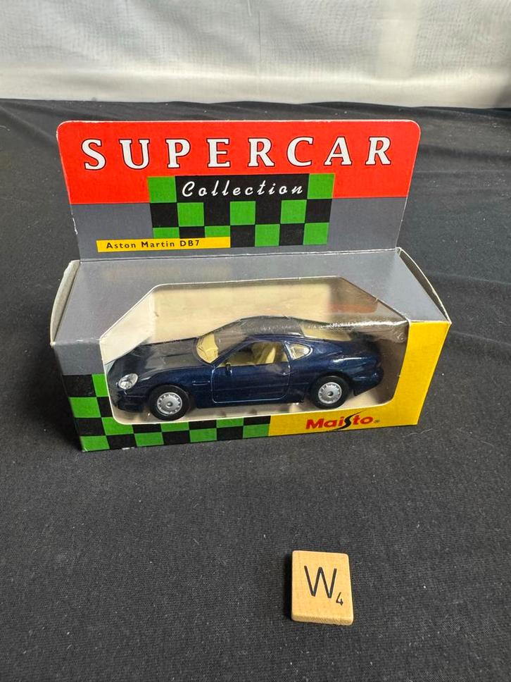 Maisto Aston Martin DB7 - Supercar Collection, Hobby en Vrije tijd, Modelauto's | 1:18, Zo goed als nieuw, Auto, Maisto, Ophalen of Verzenden