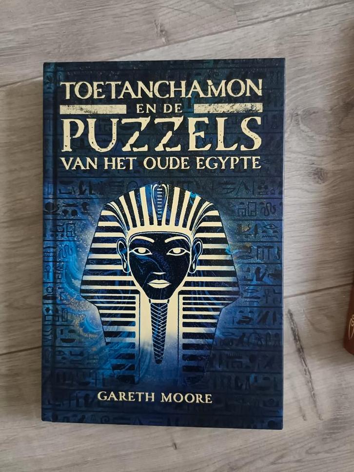 Toetanchamon en de puzzels van het Oude Egypte, Boeken, Hobby en Vrije tijd, Zo goed als nieuw, Fotograferen en Filmen, Ophalen of Verzenden