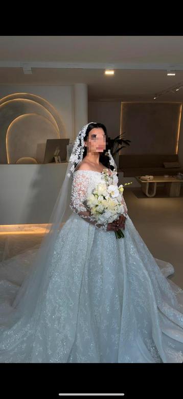 Bruidsjurk van Sima Couture beschikbaar voor biedingen