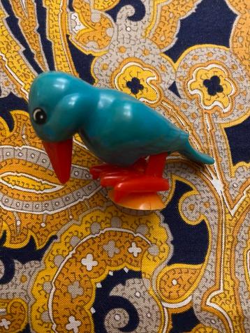VINTAGE TOMY OPWINDSPEELGOED “BLUE BIRD” RAAMKLEVER. beschikbaar voor biedingen