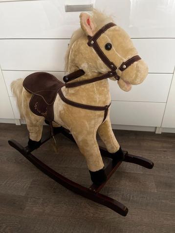 Hobbelpaard met geluid en beweging beschikbaar voor biedingen