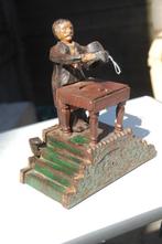 Een antieke cast iron spaarpot van de Macician bank, Ophalen of Verzenden, Metaal of Blik, Overige thema's