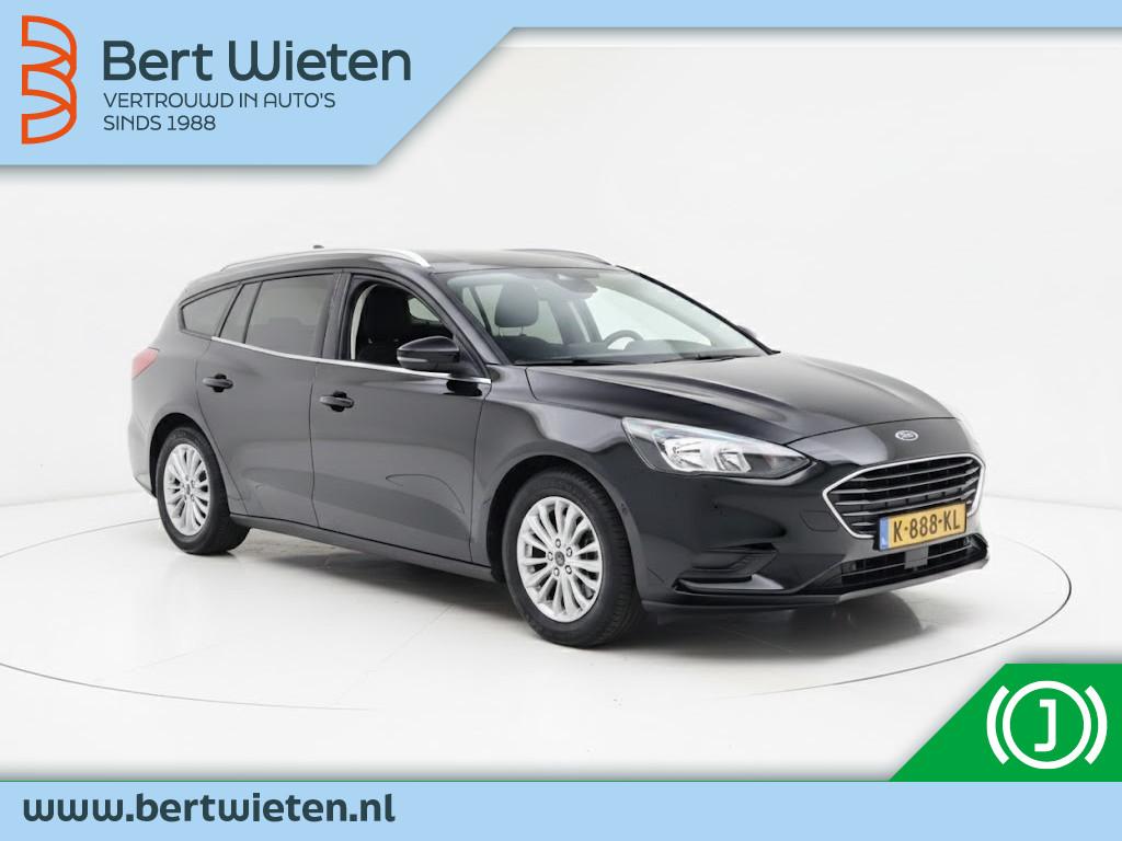 Ford FOCUS Wagon 1.0 EcoB. Titanium | Geen import | Trekhaak, Auto's, 125 pk, Gebruikt, Lichtsensor, Leder en Stof