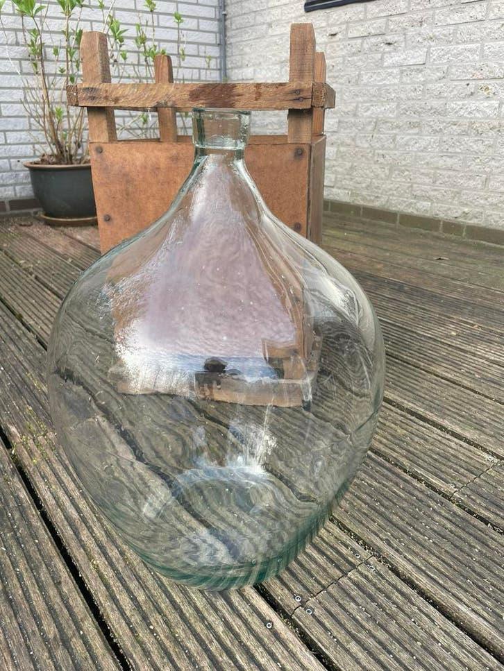 Ballon fles inc houten krat, Ophalen