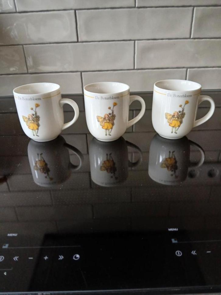 Flowerfairies Boterbloemkopjes, Douwe Egberts 2005 (3), Huis en Inrichting, Keuken | Servies, Zo goed als nieuw, Kop(pen) en/of Schotel(s)