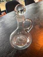 Glazen karaf met stop, Ophalen