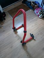 Motor paddock stand, Ophalen