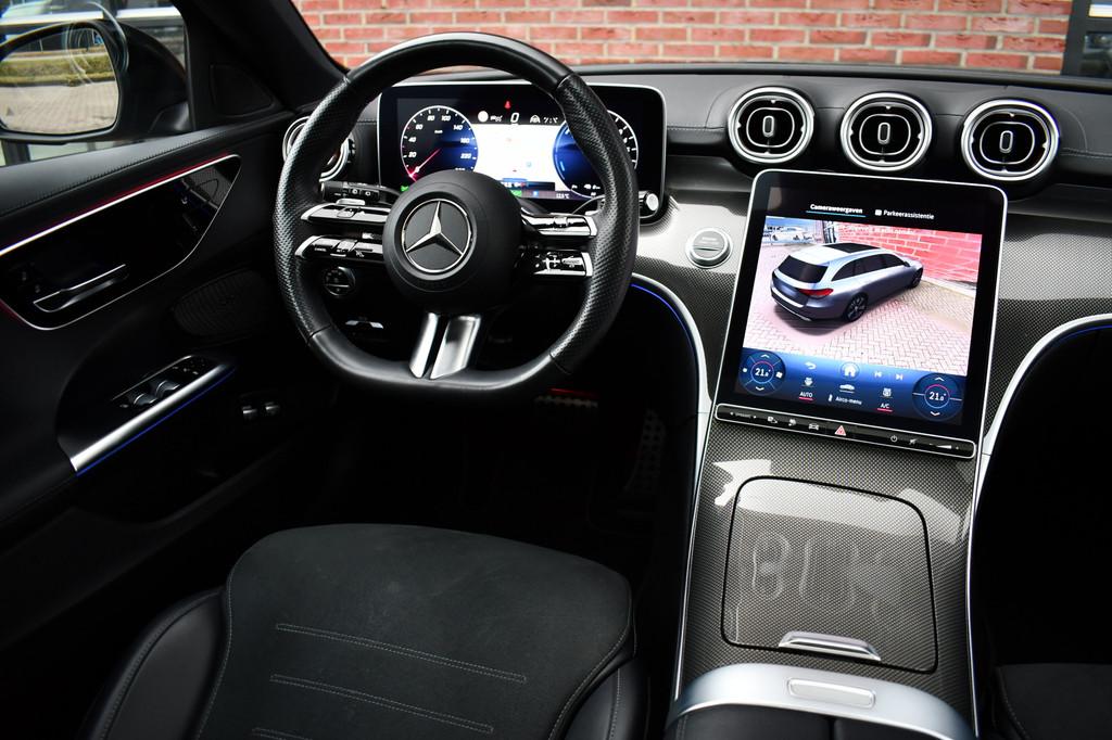 Mercedes-Benz C-Klasse Estate 300 e AMG Line Pano Trekh Dist, Auto's, Automaat, 12 maanden, Zwart, 4 cilinders