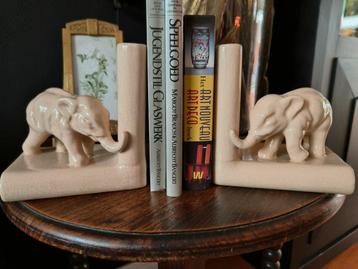 Set crèmekleurige boekensteunen met olifanten beschikbaar voor biedingen