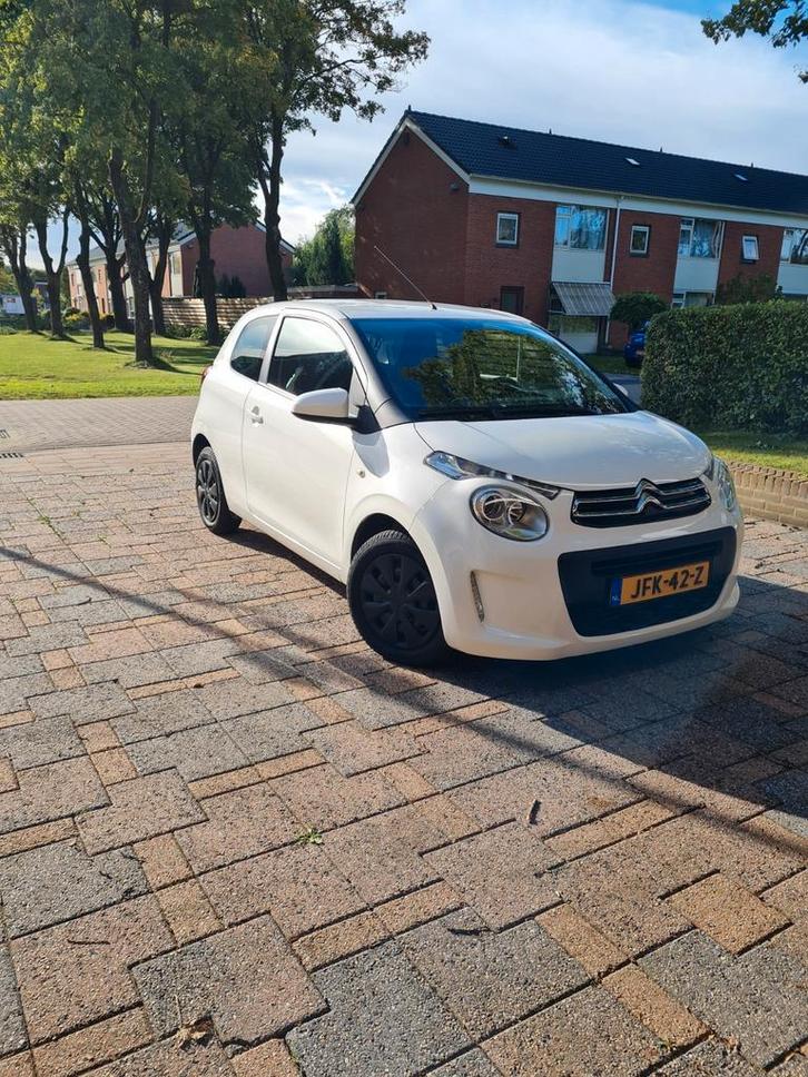 Citroën C1 1.2 60KW 3-DRS 2014 Wit, Auto's, Citroën, Particulier, C1, Climate control, Elektrische ramen, Isofix, LED verlichting