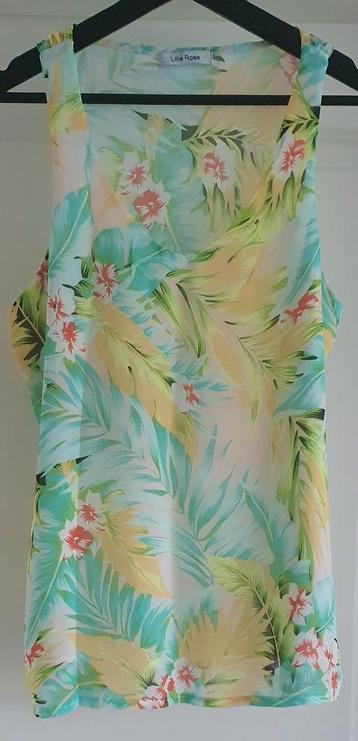 Zgan..vrolijke top van LILIE ROSE..mt:m/l beschikbaar voor biedingen