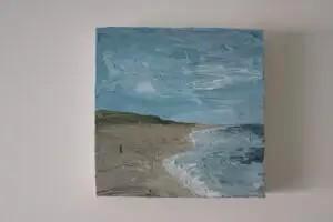 Schilderij - Minimalistisch strand met een detail beschikbaar voor biedingen