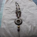 Ketting met ronde hanger., Sieraden, Tassen en Uiterlijk, Bruin, Verzenden, Zo goed als nieuw, Overige materialen