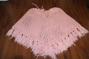 poncho roze beschikbaar voor biedingen