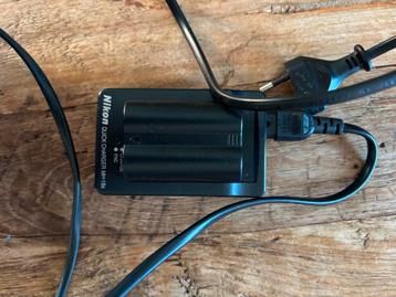 Nikkon lader met accu beschikbaar voor biedingen