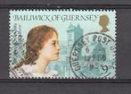 Guernsey UK met een vrouw en gebouwen, Verzenden, Gestempeld