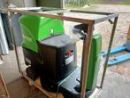 Nieuwe schrob veegmachine., Ophalen