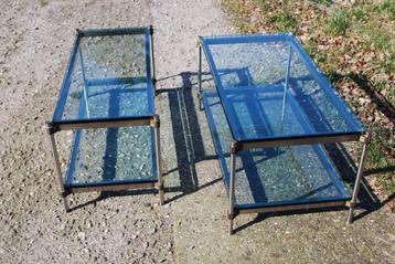 Glazen salontafel met RVS onderstel en koperen elementen beschikbaar voor biedingen