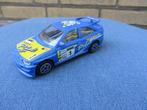 Burago Ford Escort RS Cosworth Michellin blauw, Hobby en Vrije tijd, Ophalen of Verzenden, Gebruikt, Auto, Overige merken