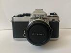 Nikon FE met een Nikkor 50 mm f1,8 lens, Audio, Tv en Foto, Fotocamera's Analoog, Ophalen, Gebruikt, Spiegelreflex, Nikon