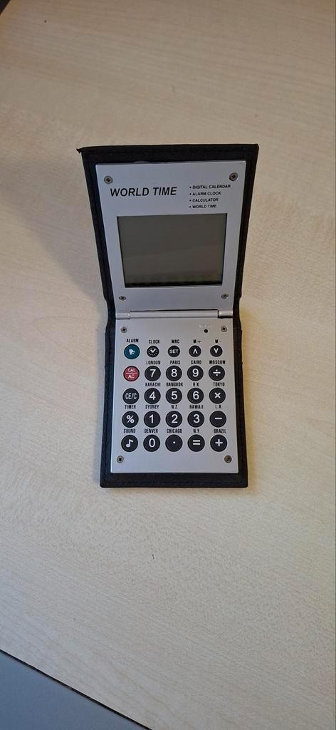 World time KLOK ALARM CALCULATOR, Verzamelen, Elektronische Apparatuur, Ophalen of Verzenden