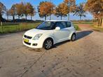 Suzuki Swift 1.3 3D 2009 Wit, Auto's, Suzuki, Stof, Stoelverwarming, Handgeschakeld, Grijs
