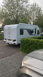 Knaus Sudwind 500 QDK ePower (10/2022), Caravans en Kamperen, Caravans, Stapelbed, Luifel, Treinzit, 5 tot 6 meter