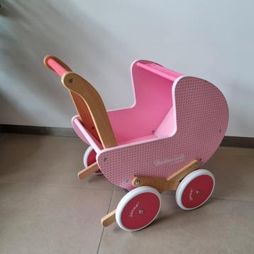 Janod houten poppenwagen.