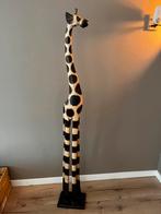 Houten giraf, Ophalen