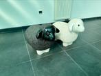 Twee beelden van een Zwart en wit schaap, Ophalen