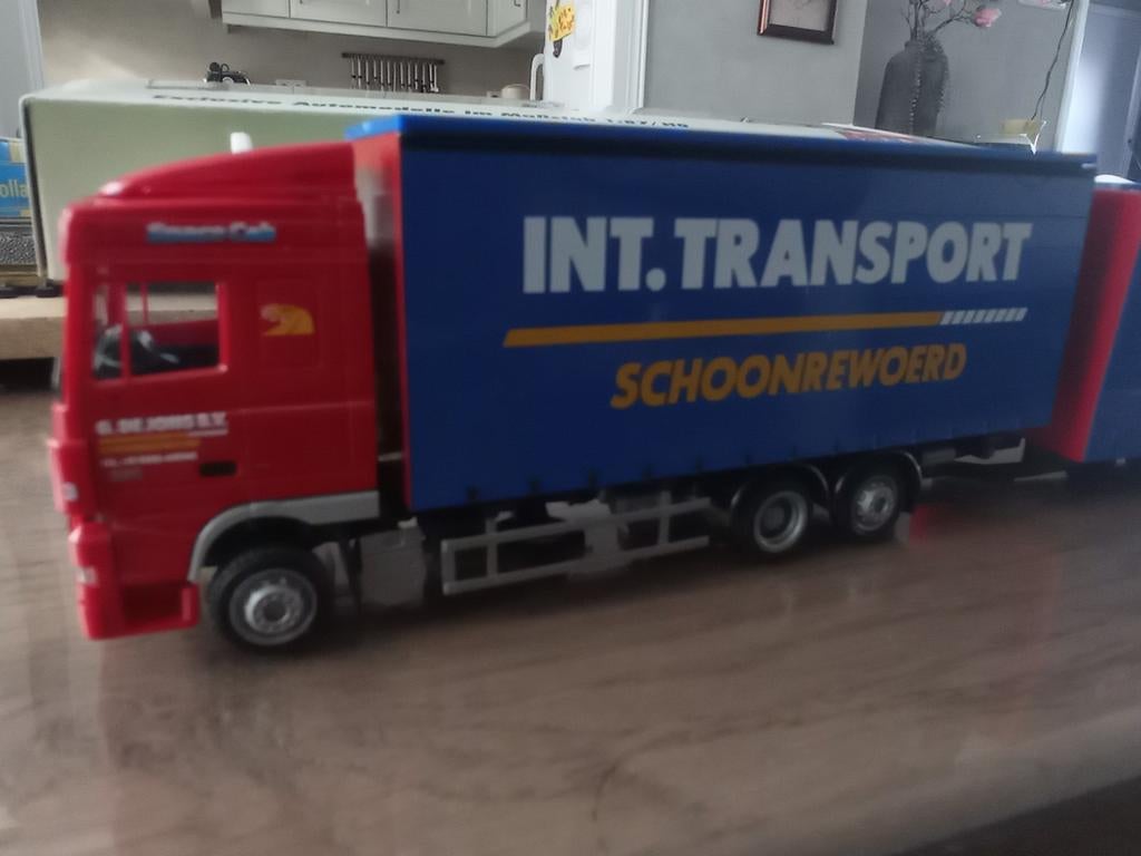 AWM G de Jong internationaal transport, Hobby en Vrije tijd, Modelauto's | 1:87, Ophalen of Verzenden, Bus of Vrachtwagen, Overige merken