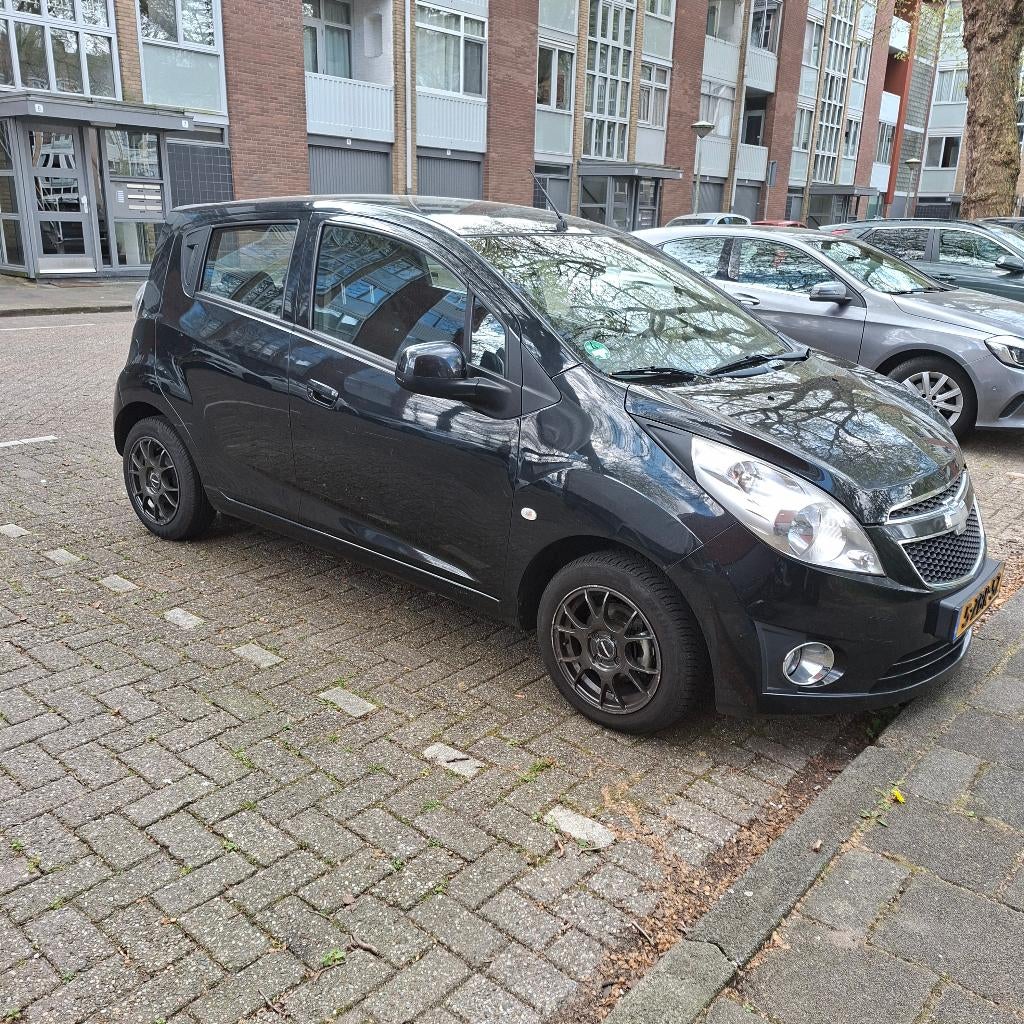 Chevrolet Spark 1.0  Zwart , 2012, Voorwielaandrijving, 839 kg, Stof, 4 cilinders
