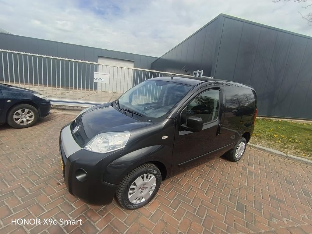 Fiat Fiorino 1.3 55KW 2011, Auto's, Stof, 74 pk, Zwart, 4 cilinders