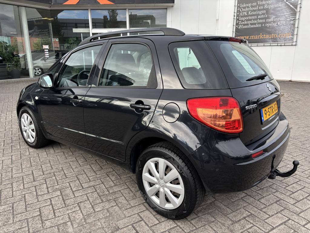 Suzuki SX4 1.6 Comfort met Airco en Trekhaak (bj 2010), Auto's, Suzuki, Euro 5, Stof, Gebruikt, Zwart
