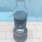 Antieke petroleum kachel, Ophalen