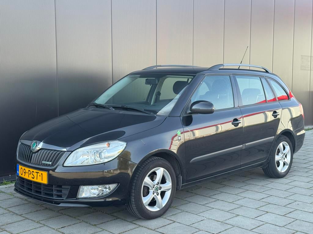 Skoda Fabia Combi 1.2 TDI 2011 Greenline Clima parkeersens, Auto's, Voorwielaandrijving, Euro 5, Stof, Zwart