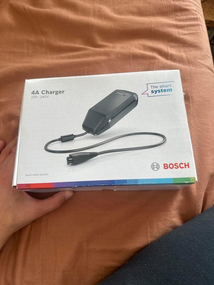 Bosch 4A Oplader voor E-bike - Nieuw in Doos, Fietsen en Brommers, Fietsaccessoires | Fietsaccu's, Nieuw, Ophalen of Verzenden