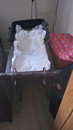 sier poppenwagen, Ophalen