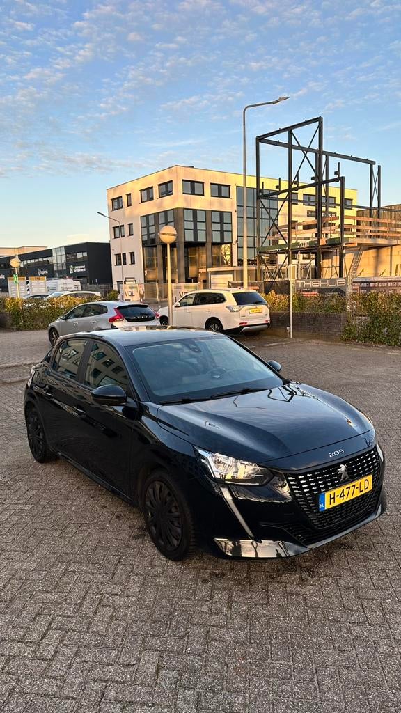 Peugeot 208 1.2 Puretech 75pk 2020 Zwart, Auto's, Voorwielaandrijving, 1199 cc, Zwart, Origineel Nederlands