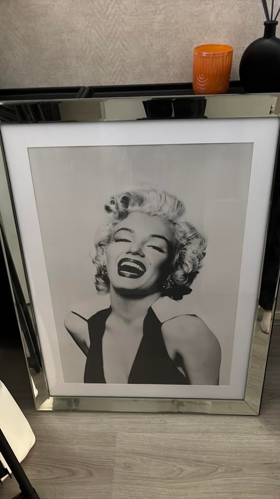 Foto in spiegellijst, Ophalen